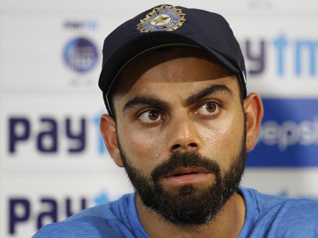 Virat Kohli (C) talks with coach Anil Kumble (R) as teammate Ajinkya Rahane (L) lduring a training session in Kolkata on Thursday. (AFP) Virat Kohli (C) talks with coach Anil Kumble (R) as teammate Ajinkya Rahane (L) lduring a training session in Kolkata on Thursday. (AFP)