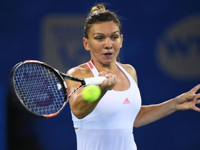 Simona Halep of Romania hits a return shot against Yaroslava Shvedova of Kazakhstan.(AP Photo) Simona Halep of Romania hits a return shot against Yaroslava Shvedova of Kazakhstan.(AP Photo)