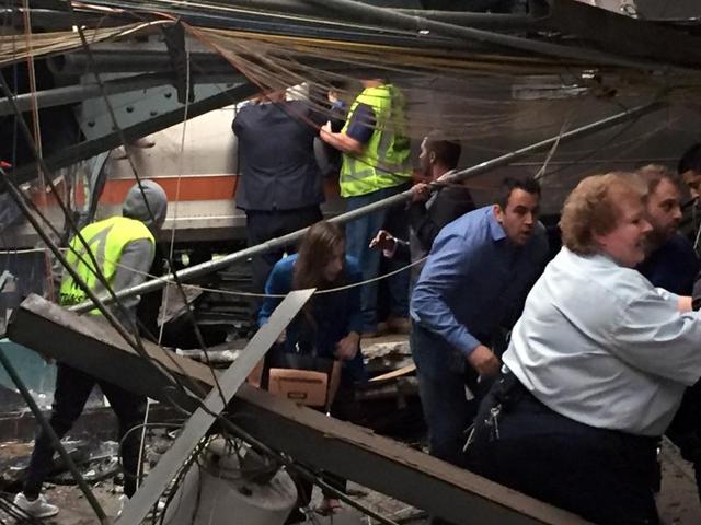Passengers rush to safety after a New Jersey Transit train crashed in to the platform in Hoboken, New Jersey.(AFP Photo) Passengers rush to safety after a New Jersey Transit train crashed in to the platform in Hoboken, New Jersey.(AFP Photo)