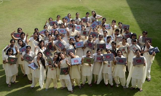Girls posing with their laptops. (HT file photo) Girls posing with their laptops. (HT file photo)