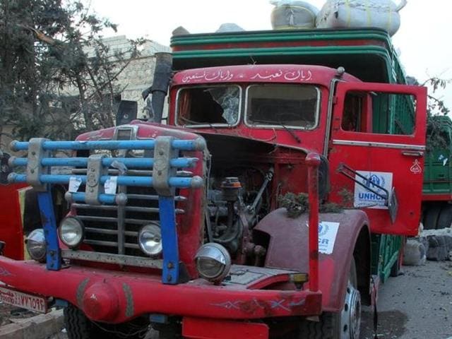 This image provided by the Syrian anti-government group Aleppo 24 news, shows damaged trucks carrying aid, in Aleppo, Syria. . (AP) This image provided by the Syrian anti-government group Aleppo 24 news, shows damaged trucks carrying aid, in Aleppo, Syria. . (AP)
