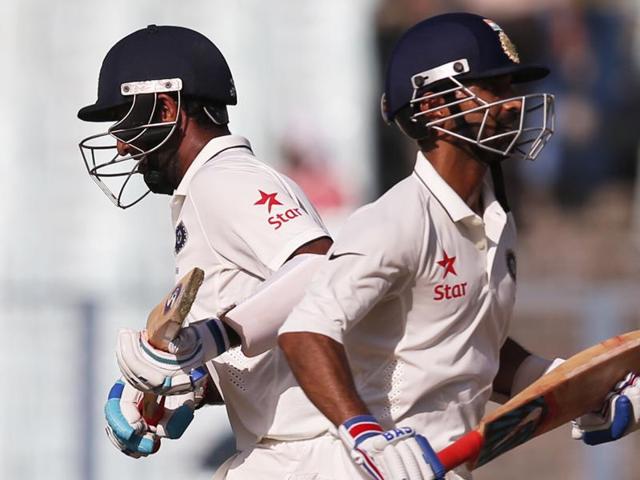 Cheteshwar Pujara is greeted by Ajinkya Rahane (L) for his half century during 1st day of 2nd Test Match.(PTI Photo) Cheteshwar Pujara is greeted by Ajinkya Rahane (L) for his half century during 1st day of 2nd Test Match.(PTI Photo)