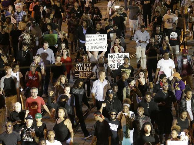 In this file photo, demonstrators protest the fatal police shooting of Keith Lamont Scott in Charlotte, North Carolina.(AP Photo) In this file photo, demonstrators protest the fatal police shooting of Keith Lamont Scott in Charlotte, North Carolina.(AP Photo)