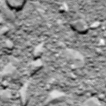 A photo, probably Rosetta's last image of Comet 67P/Churyumov-Gerasimenko, taken shortly before impact. (AP) A photo, probably Rosetta's last image of Comet 67P/Churyumov-Gerasimenko, taken shortly before impact. (AP)