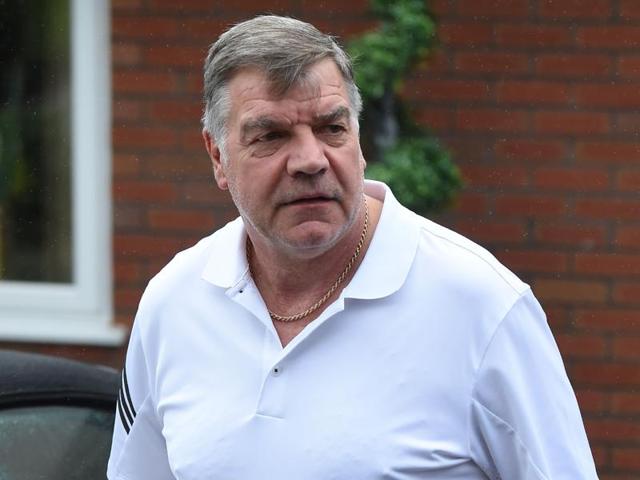 Former England national football team manager Sam Allardyce walks out of his home in Bolton.(AFP Photo) Former England national football team manager Sam Allardyce walks out of his home in Bolton.(AFP Photo)
