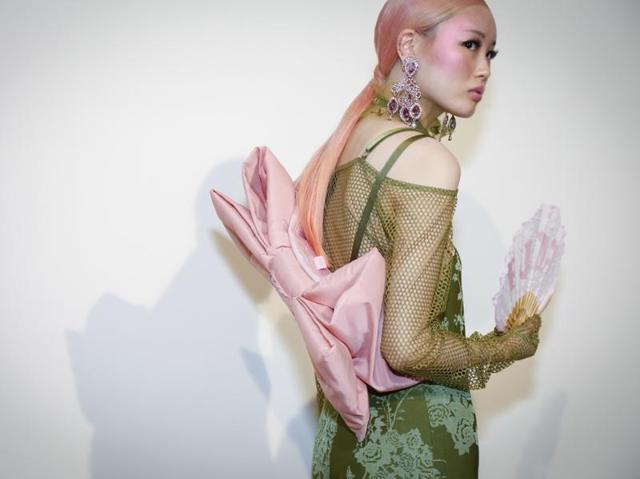 The collection is all about pinks and greens and laces and nets. (NYT) The collection is all about pinks and greens and laces and nets. (NYT)