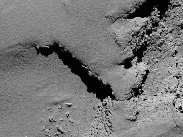 Scientists at the control centre in Darmstadt clapped as hugged after screens showed the loss of signal as Rosetta touched down on the comet. (AFP) Scientists at the control centre in Darmstadt clapped as hugged after screens showed the loss of signal as Rosetta touched down on the comet. (AFP)