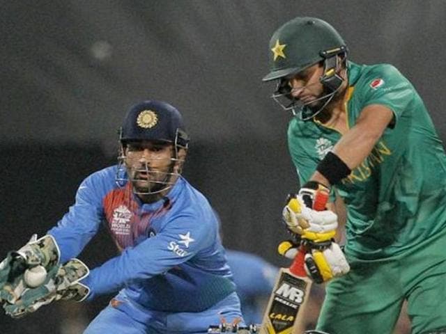 India's MS Dhoni collects a ball as Pakistan's Shahid Afridi bats during the ICC World Twenty20 2016.(AP Photo) India's MS Dhoni collects a ball as Pakistan's Shahid Afridi bats during the ICC World Twenty20 2016.(AP Photo)