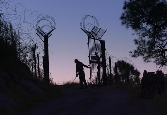 In this file photo, an Indian Army soldier closes the gates of a fence near the Line of Control in Barasingha area near Bhimber Gali. (Gurinder Osan/HT File Photo) In this file photo, an Indian Army soldier closes the gates of a fence near the Line of Control in Barasingha area near Bhimber Gali. (Gurinder Osan/HT File Photo)