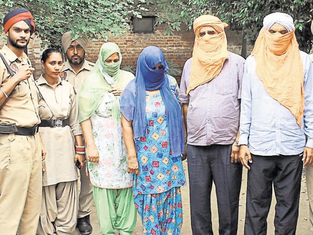 The accused in police custody in Ludhiana on Thursday. (HT Photo) The accused in police custody in Ludhiana on Thursday. (HT Photo)