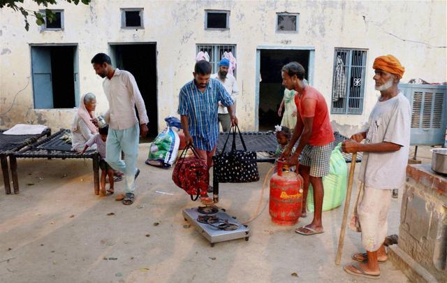 People migrating from a border village following government's evacuation orders for the villages in Attari. (PTI) People migrating from a border village following government's evacuation orders for the villages in Attari. (PTI)