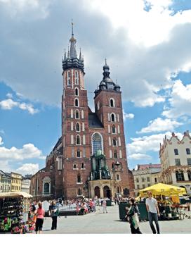 Krakow’s Stare Miasto boasts of the largest medieval Main Square in Europe. Everyone stops by St Mary Church which is right at the start.