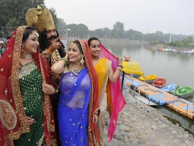 Ramlila artistes in costume at Sukhna Lake in Chandigarh on Saturday. (Karun Sharma/HT)