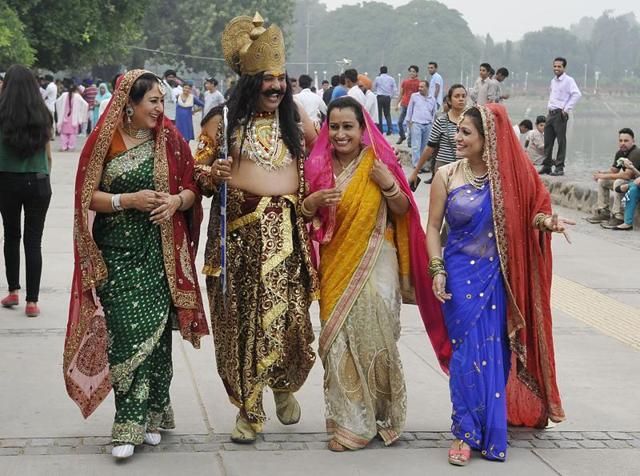 Ramlila artistes in costume at Sukhna Lake in Chandigarh on Saturday. (Karun Sharma/HT)