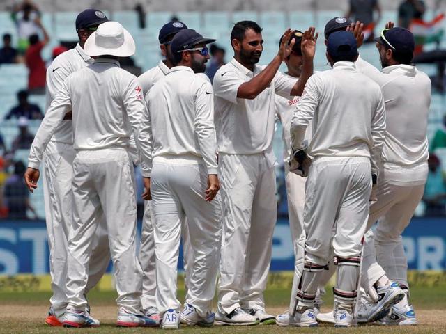 India's Mohammed Shami celebrates with teammates after taking the wicket of Tom Latham. (REUTERS) India's Mohammed Shami celebrates with teammates after taking the wicket of Tom Latham. (REUTERS)