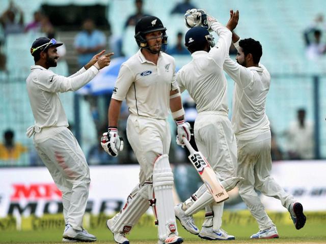 Ravindra Jadeja celebrates with teammates after the dismissal of Luke Ronchi. (PTI photo) Ravindra Jadeja celebrates with teammates after the dismissal of Luke Ronchi. (PTI photo)