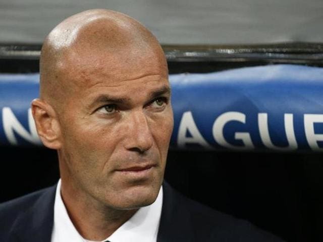Real Madrid's coach Zinedine Zidane reacts during their match against Borussia Dortmund. (REUTERS) Real Madrid's coach Zinedine Zidane reacts during their match against Borussia Dortmund. (REUTERS)