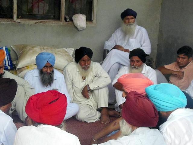 Relatives mourning the death in Hambowal Bet village in Ludhiana on Friday. (HT Photo) Relatives mourning the death in Hambowal Bet village in Ludhiana on Friday. (HT Photo)