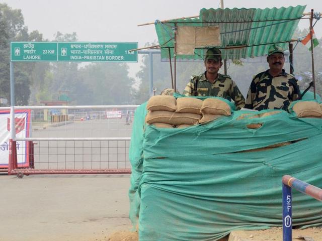 BSF personnel stand guard at the India-Pakistan Wagah Border.(AFP Photo)