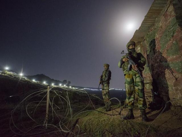 Army soldiers at forward posts beyond the illuminated fence in Hamirpur area, about 180 km north west of Jammu, in September 2015. (Gurinder Osan/HT File Photo) Army soldiers at forward posts beyond the illuminated fence in Hamirpur area, about 180 km north west of Jammu, in September 2015. (Gurinder Osan/HT File Photo)