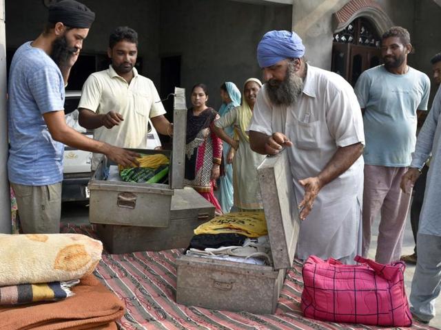 Despite evacuation messages having been flashed, people have been left to fend for themselves. In many villages people could be seen loading luggage and moving to their relatives in the city and/or “safer” villages and also arranging for transportation on their own.(Gurpreet Singh/HT Photo)