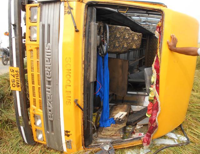Bus of Guru Amardass Canadian School that overturned. (HT Photo)