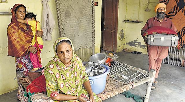 Veero Kaur with her family members in Mullakot, which is 20 meters away from the fence in Amritsar. Her family has to leave their house near the Attari boarder area, but have nowhere to go. (Gurpreet Singh/HT)