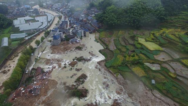 The site of a landslide caused by heavy rains brought by Typhoon Megi, in Sucun Village, Lishui, Zhejiang province in China. (Reuters Photo)