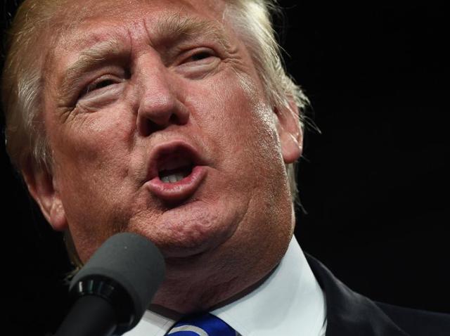 US Republican presidential nominee Donald Trump speaks during a campaign rally at the Suburban Collection Showplace in Novi, Michigan. (AFP Photo) US Republican presidential nominee Donald Trump speaks during a campaign rally at the Suburban Collection Showplace in Novi, Michigan. (AFP Photo)