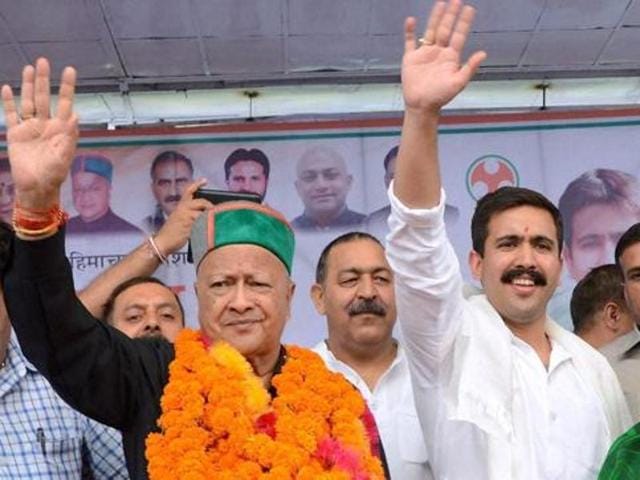 HP CM Virbhadra Singh with his wife Pratibha Singh (R) and son Vikramaditya (C). (PTI file photo) HP CM Virbhadra Singh with his wife Pratibha Singh (R) and son Vikramaditya (C). (PTI file photo)