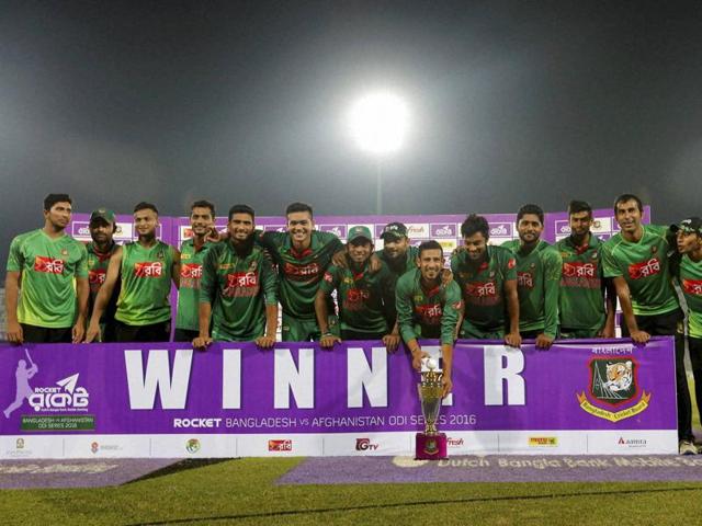 Bangladesh players pose with the trophy after their win. (AP) Bangladesh players pose with the trophy after their win. (AP)
