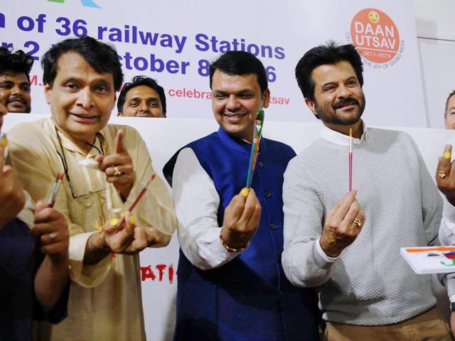 Union Railway Minister Suresh Prabhu, Chief Minister of Maharashtra Devendra Fadanvis and Bollywood actor Anil Kapoor during the launch of beautification of 36 suburban railway stations of Mumbai on the occasion of Gandhi Jayanti. (PTI Photo) Union Railway Minister Suresh Prabhu, Chief Minister of Maharashtra Devendra Fadanvis and Bollywood actor Anil Kapoor during the launch of beautification of 36 suburban railway stations of Mumbai on the occasion of Gandhi Jayanti. (PTI Photo)