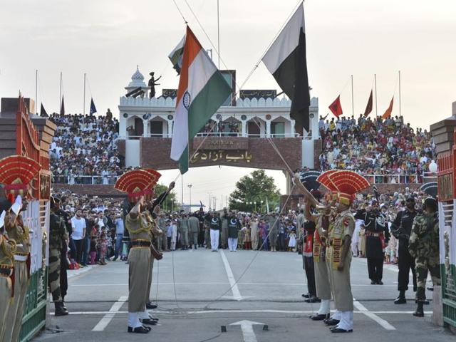 Indian and Pakistani flags are lowered during a daily retreat ceremony at the India-Pakistan joint border check post of Attari-Wagah near Amritsar.(AP File Photo) Indian and Pakistani flags are lowered during a daily retreat ceremony at the India-Pakistan joint border check post of Attari-Wagah near Amritsar.(AP File Photo)