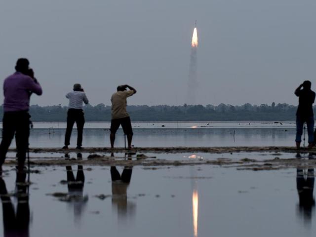 Residents photograph the launch of the Indian Space Research Organisation (Isro) Polar Satellite Launch Vehicle (PSLV-C35), carrying equipment which will be used to monitor oceans and weather at Sriharikota in Andhra Pradesh. (AFP Photo) Residents photograph the launch of the Indian Space Research Organisation (Isro) Polar Satellite Launch Vehicle (PSLV-C35), carrying equipment which will be used to monitor oceans and weather at Sriharikota in Andhra Pradesh. (AFP Photo)