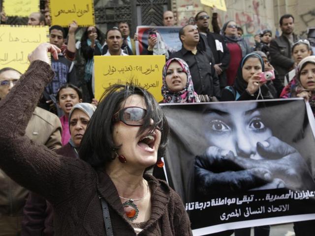 An Egyptian activist shouts anti-military Supreme Council slogans with a poster in Arabic reading " March 9, 2011, protesters torture " and " We did not want the Egyptian woman to be a second-class citizen", during a demonstration in front of Cairo's high court. Egypt’s top women’s advocacy group has filed a complaint against a lawmaker who called for mandatory virginity tests for women seeking university admission. (AP file photo) An Egyptian activist shouts anti-military Supreme Council slogans with a poster in Arabic reading " March 9, 2011, protesters torture " and " We did not want the Egyptian woman to be a second-class citizen", during a demonstration in front of Cairo's high court. Egypt’s top women’s advocacy group has filed a complaint against a lawmaker who called for mandatory virginity tests for women seeking university admission. (AP file photo)