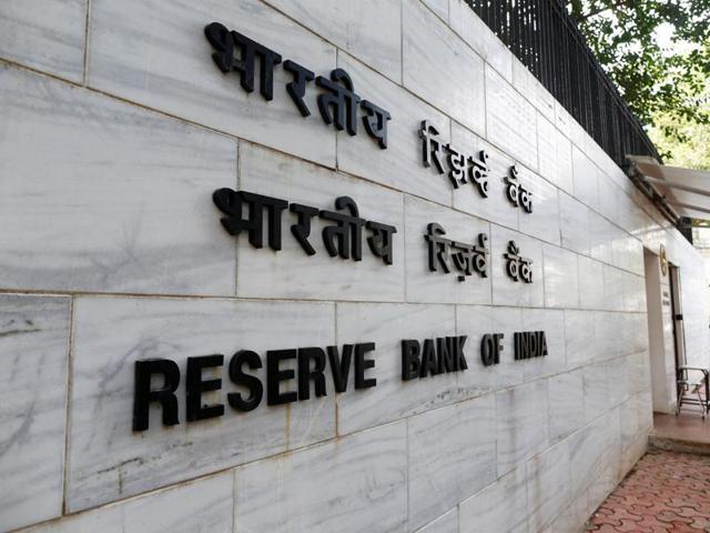 A police officer stands guard in front of the RBI head office in Mumbai. (Reuters File Photo) A police officer stands guard in front of the RBI head office in Mumbai. (Reuters File Photo)