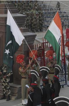Pakistani border guards take part in a daily border closing ceremony at the Wagah border post in Pakistan. (AP Photo) Pakistani border guards take part in a daily border closing ceremony at the Wagah border post in Pakistan. (AP Photo)