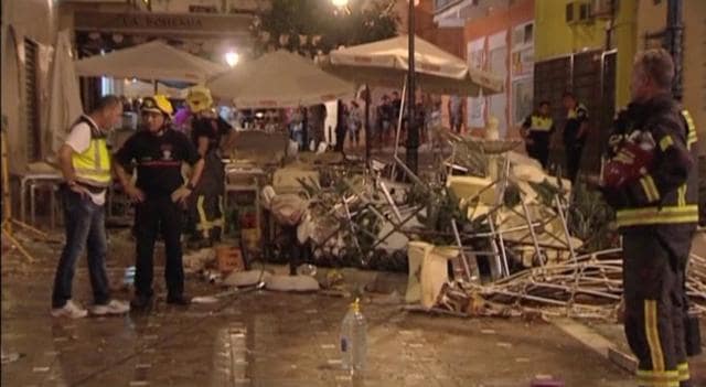 Police and rescue services are pictured at the scene after a gas cylinder exploded in a cafe in Velez-Malaga, Spain on Saturday night (Reuters) Police and rescue services are pictured at the scene after a gas cylinder exploded in a cafe in Velez-Malaga, Spain on Saturday night (Reuters)