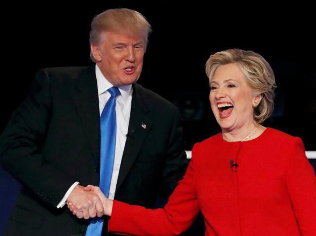 Republican US presidential nominee Donald Trump shakes hands with Hillary Clinton at the conclusion of their first presidential debate at Hofstra University in Hempstead, New York. (Reuters Photo) Republican US presidential nominee Donald Trump shakes hands with Hillary Clinton at the conclusion of their first presidential debate at Hofstra University in Hempstead, New York. (Reuters Photo)