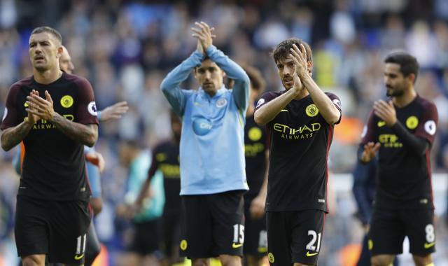 Manchester City’s David Silva, second right, applauds his teams fans. (AP Photo)