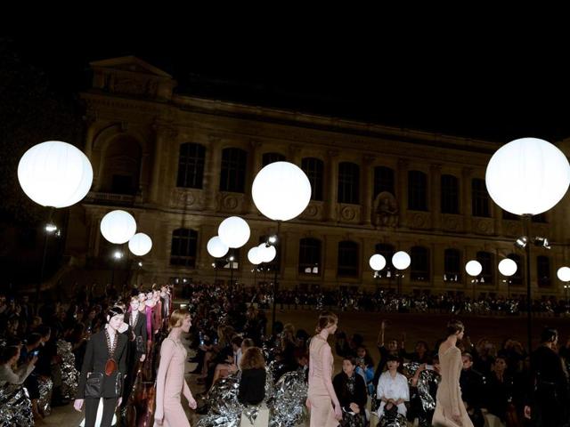 Models walk the ramp for Givenchy. (AFP)
