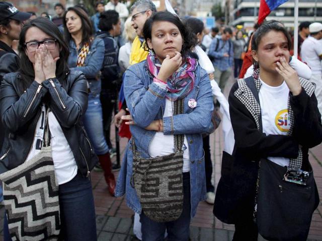 Supporters of "No" vote celebrate after the nation voted against a peace deal between the government and Revolutionary Armed Forces of Colombia (FARC) rebels, in Bogota, Colombia on Sunday. (Reuters) Supporters of "No" vote celebrate after the nation voted against a peace deal between the government and Revolutionary Armed Forces of Colombia (FARC) rebels, in Bogota, Colombia on Sunday. (Reuters)