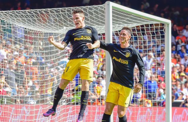Atletico Madrid's Kevin Gameiro (L) celebrates a goal with Fernando Torres. (AFP) Atletico Madrid's Kevin Gameiro (L) celebrates a goal with Fernando Torres. (AFP)