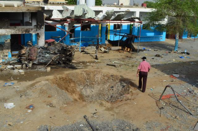 A Yemeni man walking past a crater in the courtyard of an hospital operated by the Paris-based aid agency Doctors Without Borders (MSF) in Abs. (AFP File Photo) A Yemeni man walking past a crater in the courtyard of an hospital operated by the Paris-based aid agency Doctors Without Borders (MSF) in Abs. (AFP File Photo)