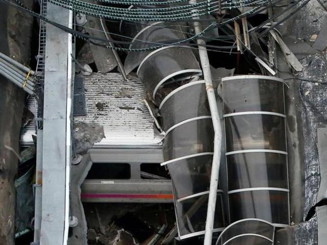A train car is pictured in an aerial photo inside the New Jersey Transit Hoboken terminal following a train crash in Hoboken, New Jersey, US. (Reuters Photo) A train car is pictured in an aerial photo inside the New Jersey Transit Hoboken terminal following a train crash in Hoboken, New Jersey, US. (Reuters Photo)