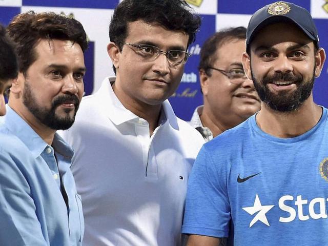 BCCI President Anurag Thakur and CAB President Sourav Ganguly with Indian Captain Virat Kohli. (PTI Photo) BCCI President Anurag Thakur and CAB President Sourav Ganguly with Indian Captain Virat Kohli. (PTI Photo)