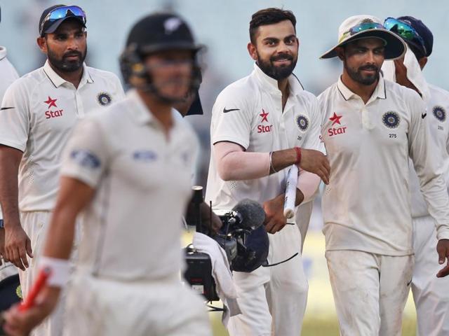 Indian cricket team captain Virat Kohli, third right, and teammates return to the pavilion. (AP Photo)