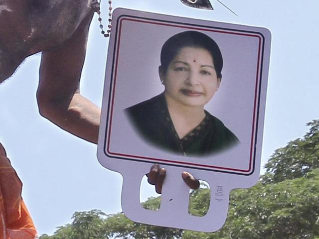An Amma follower pierces his skin and hangs from a crane for 45 minutes, in penance and prayers for well being of Jayalalithaa. This is a scene at Senniamman temple in RK Nagar, the constituency that the chief minister represents in state assembly. (V Srinivasulu/HT Photo) An Amma follower pierces his skin and hangs from a crane for 45 minutes, in penance and prayers for well being of Jayalalithaa. This is a scene at Senniamman temple in RK Nagar, the constituency that the chief minister represents in state assembly. (V Srinivasulu/HT Photo)