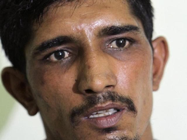 Mubeen Rajhu, who killed his sister Tasleem, talks at police headquarters in Lahore, Pakistan. (AP Photo) Mubeen Rajhu, who killed his sister Tasleem, talks at police headquarters in Lahore, Pakistan. (AP Photo)