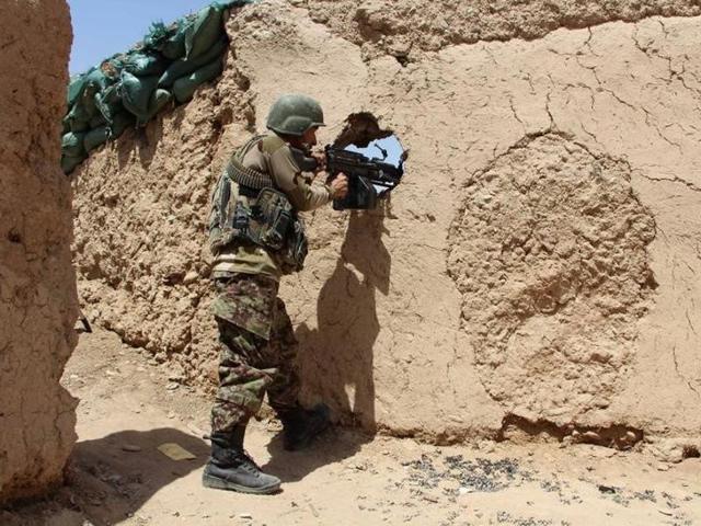 An Afghan National Army (ANA) soldier mans his position at an outpost in Babaji area of Lashkar Gah Helmand province, Afghanistan. (Reuters File Photo) An Afghan National Army (ANA) soldier mans his position at an outpost in Babaji area of Lashkar Gah Helmand province, Afghanistan. (Reuters File Photo)